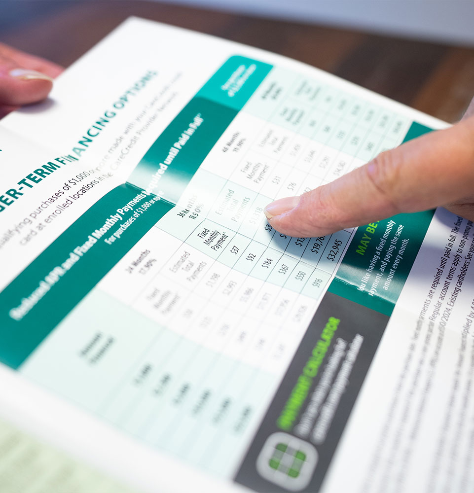 care credit brochure close up with patient looking at options