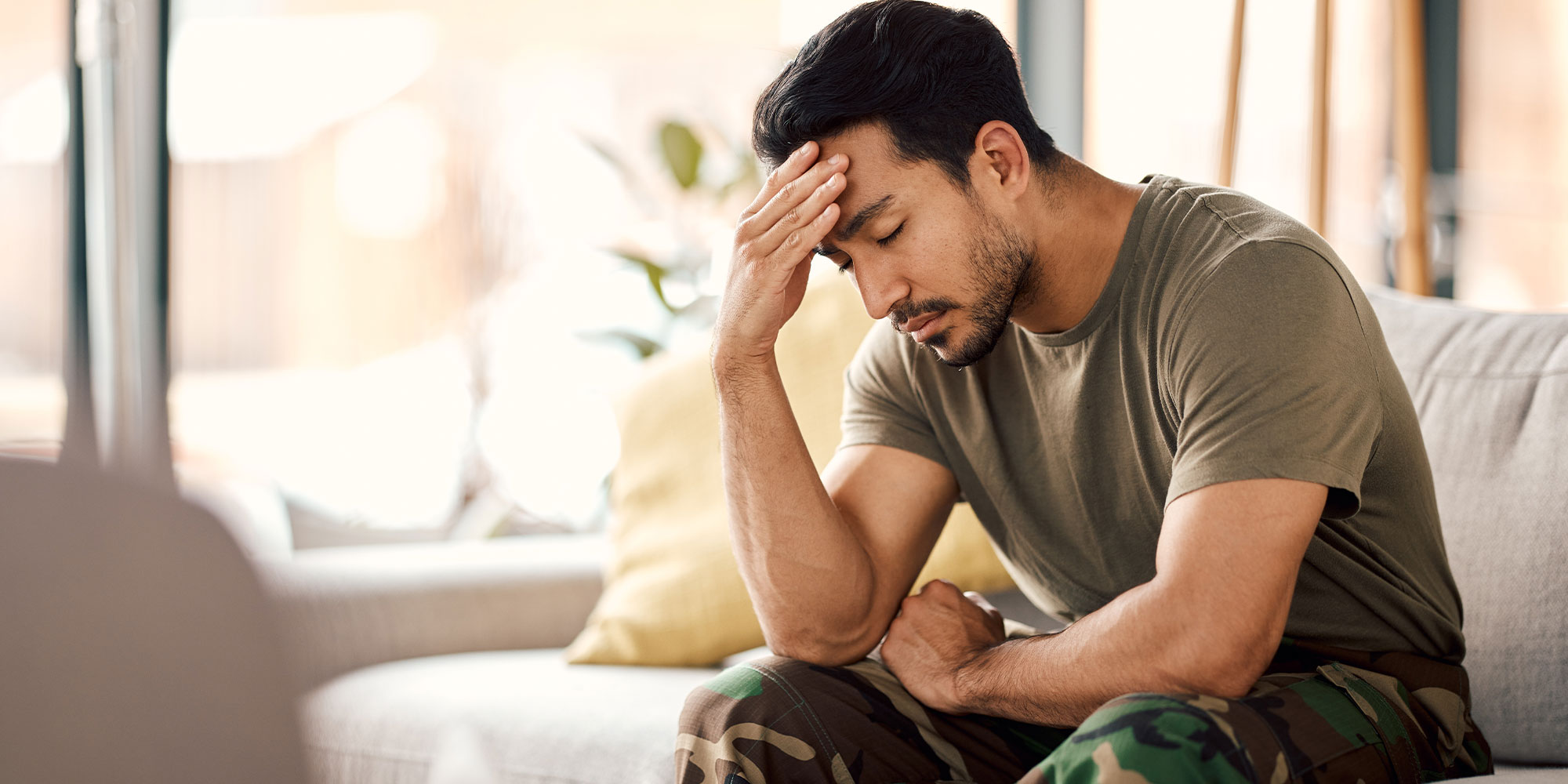 Man with headache, stress and mental health problem from tmj