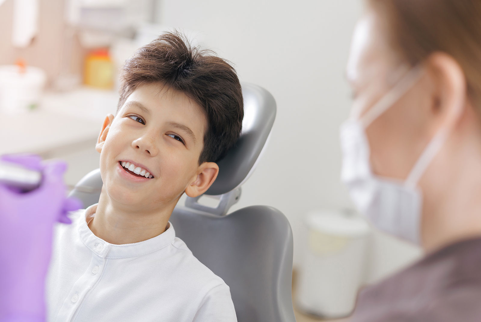 young pre teen getting dental examination done