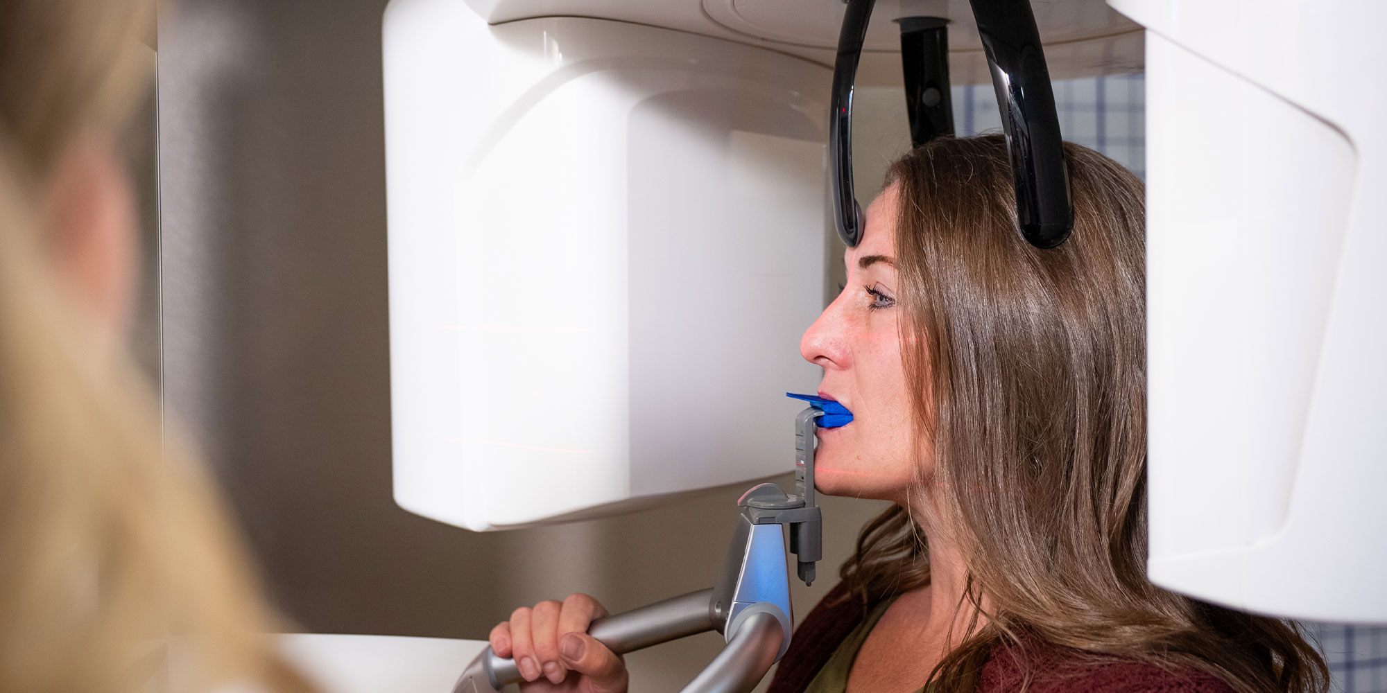 patient undergoing a cbct scan for their dental procedure