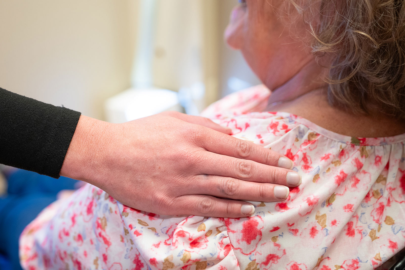 patient receiving comfort at the dental center before their treatment