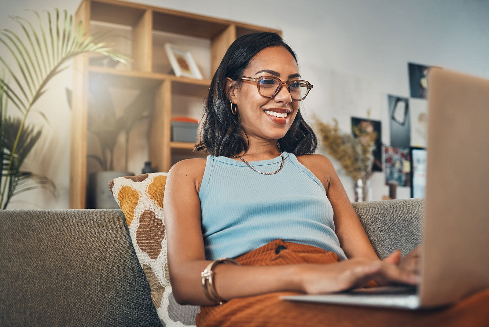 young woman and working from home with a smile writing for website